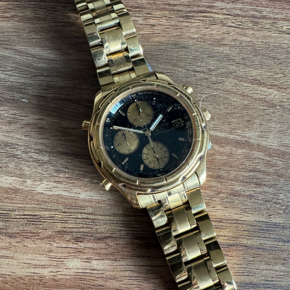 Seiko Gold Men's Watch with Black Dial
